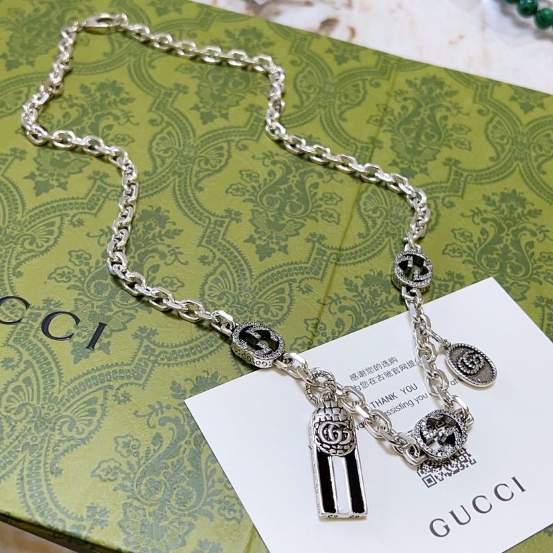 G*u*i necklaces